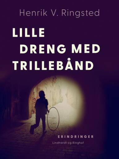 Lille dreng med trillebånd